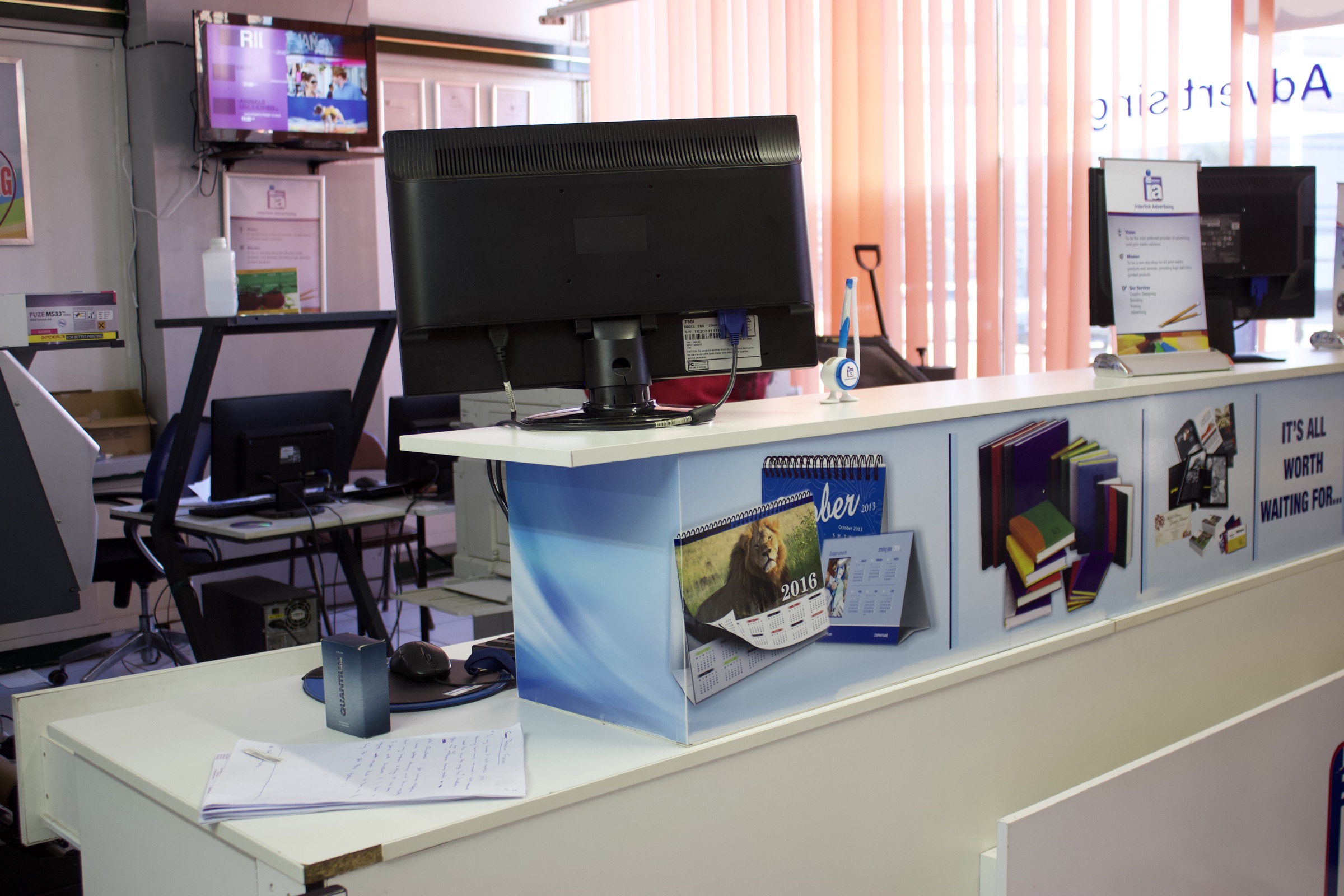 Point-of-sale counter and workstation in a local retail business